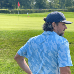 Man looking at golf course